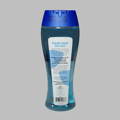 Blue bottle of 'fresh mist' body wash on a surface